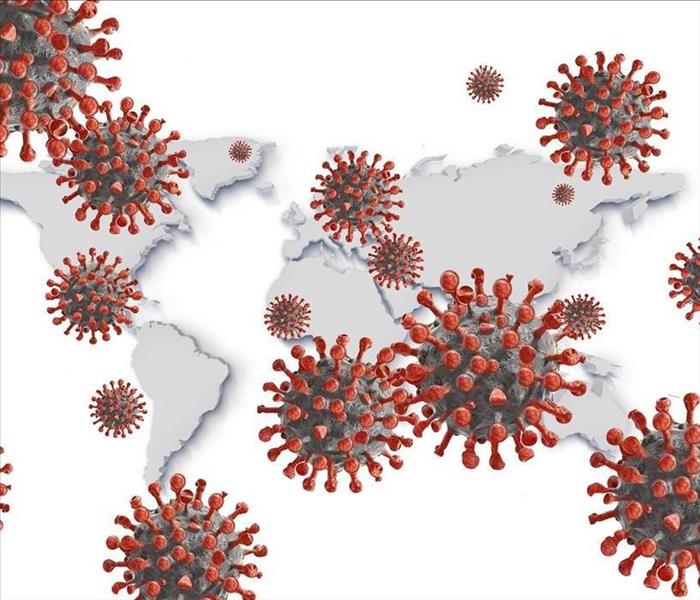 An illustration of coronavirus against a world map background.